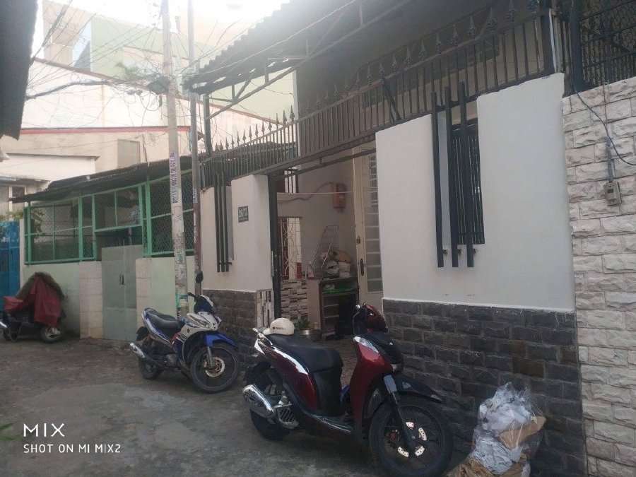 Bán nhà Hẻm xe hơi đỗ cổng đường Nơ Trang Long 70m2, Ngang 5m.
